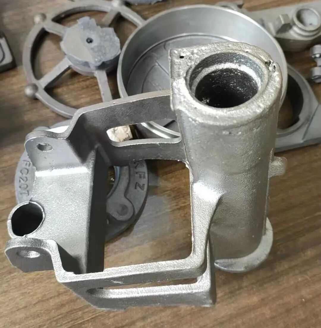 Zdravljenje hude poroznosti v valjastih cevastih peščenih jedrih med proizvodnjo delov iz nodularne litine z uporabo tehnologije oblikovanja v zelenem pesku